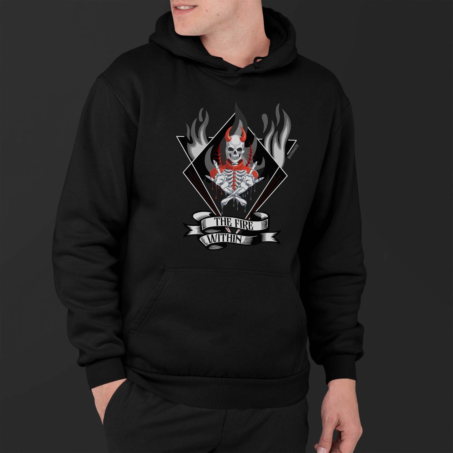 man-wearing-a-black-hoodie-with-evil-skeleton-print-with-text-the-fire-within