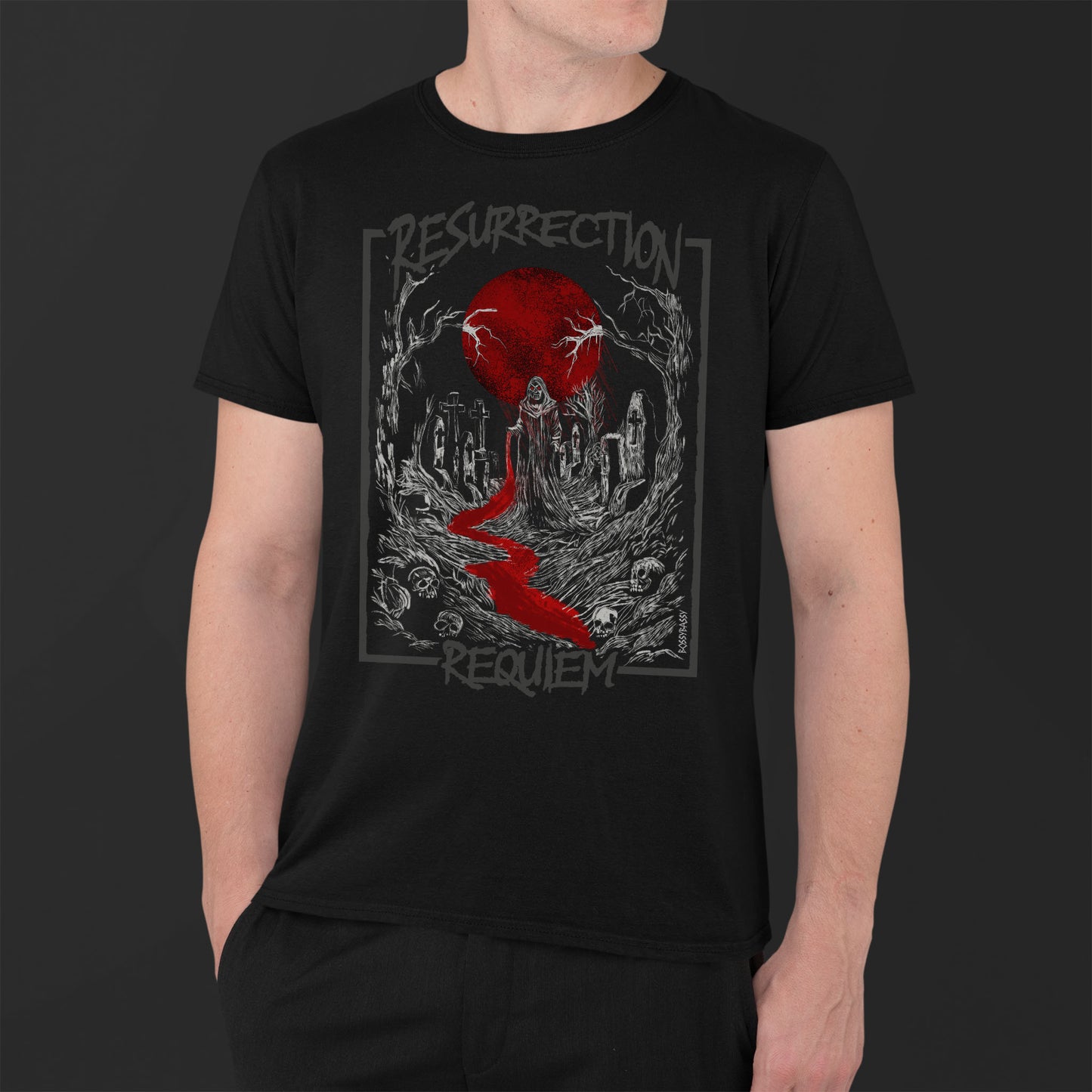 man wearing a black unisex t-shirt features an illustration in a graveyard at nightime with a full moon and the text resurrection requiem