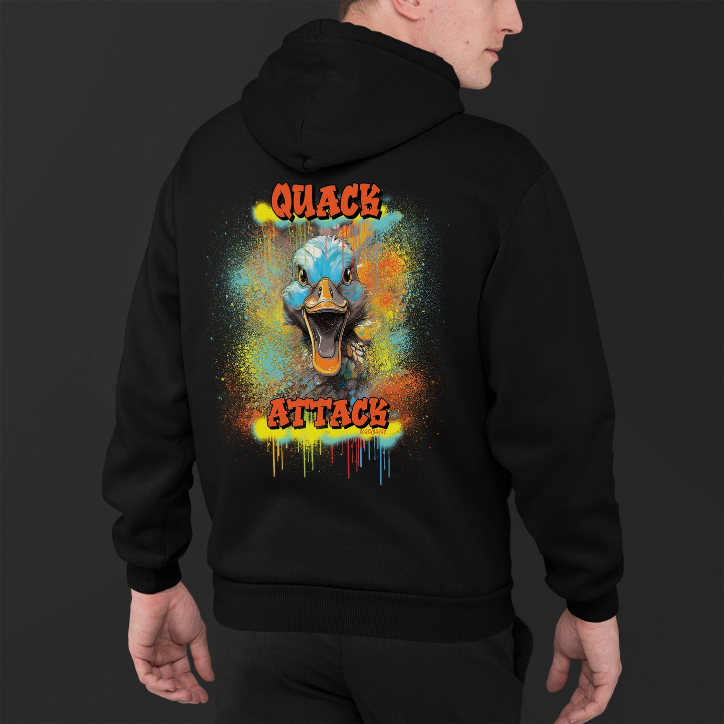 Young Man Wearing A Black Hoodie With A Illustration Of A Colorfull Crazy Street Duck And Text Quack Attack-Graffiti Style Design