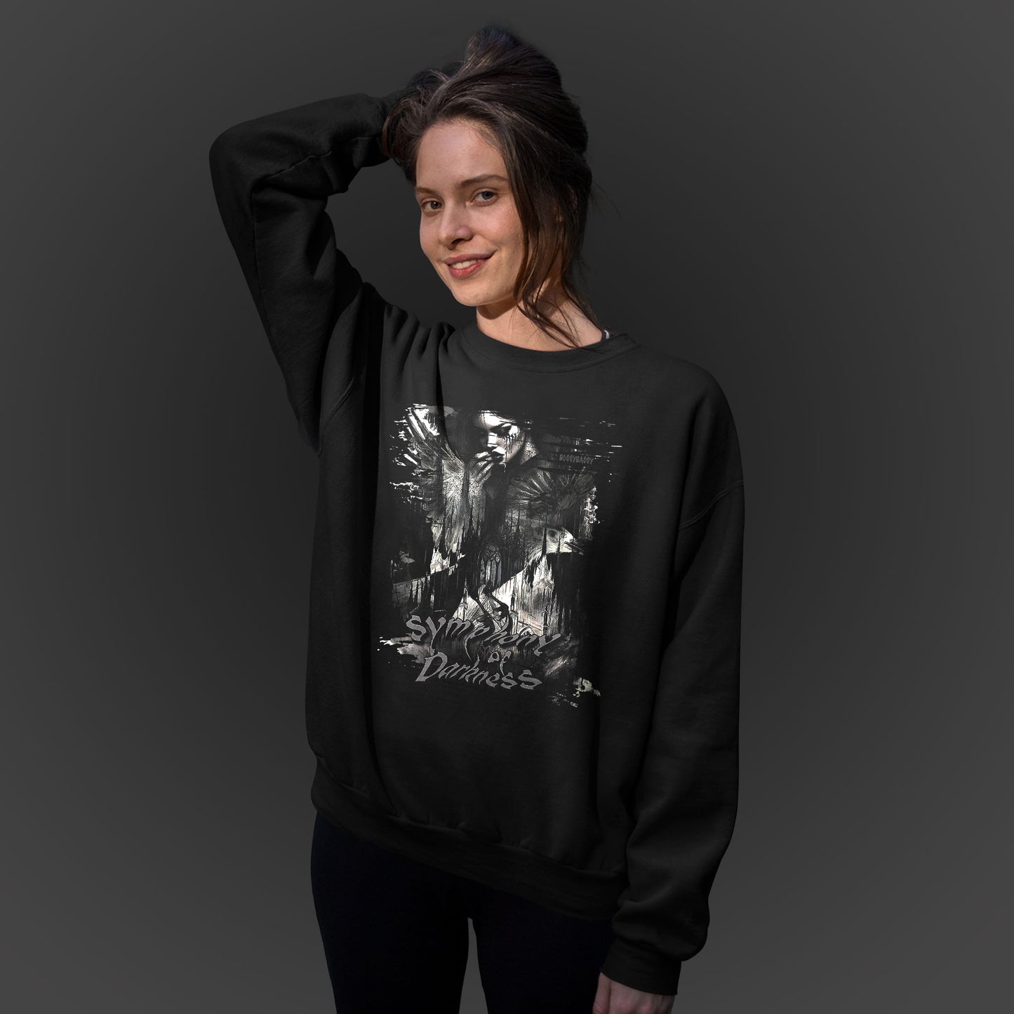 young-couple-wearing-a-black-sweatshirt-with-a-goth-crying-woman-cathedral-and-mourning-raven-print-with-text-symphony-of-darkness