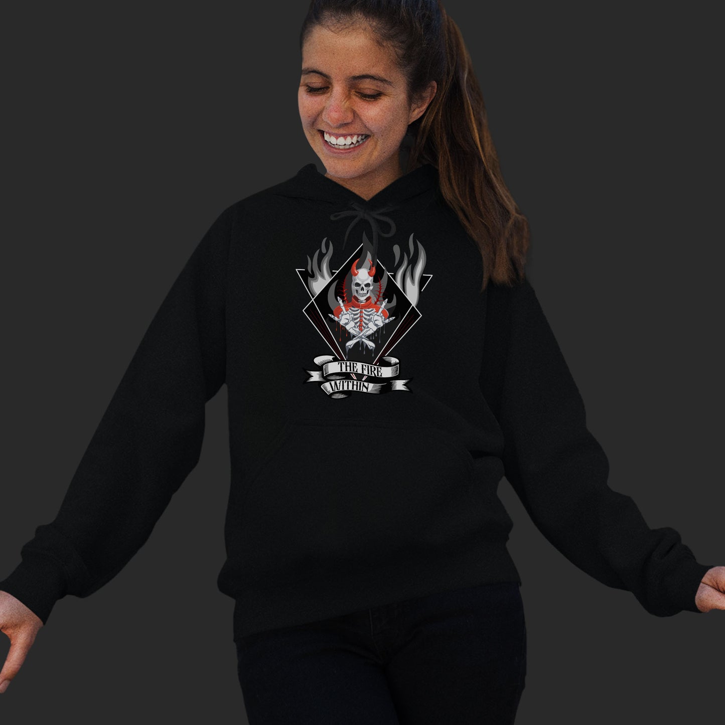 woman-wearing-a-black-hoodie-with-evil-skeleton-print-with-text-the-fire-within