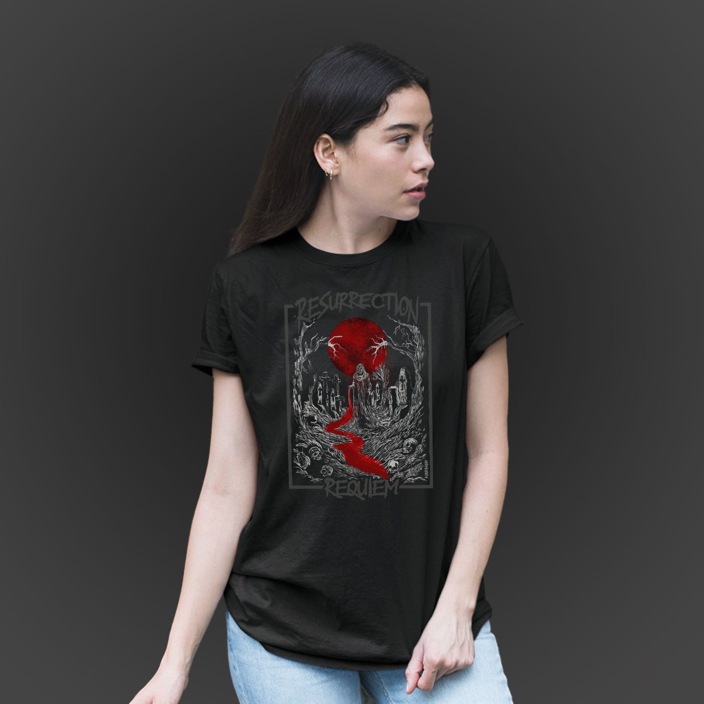 woman wearing a black unisex t-shirt features an illustration in a graveyard at nightime with a full moon and the text resurrection requiem