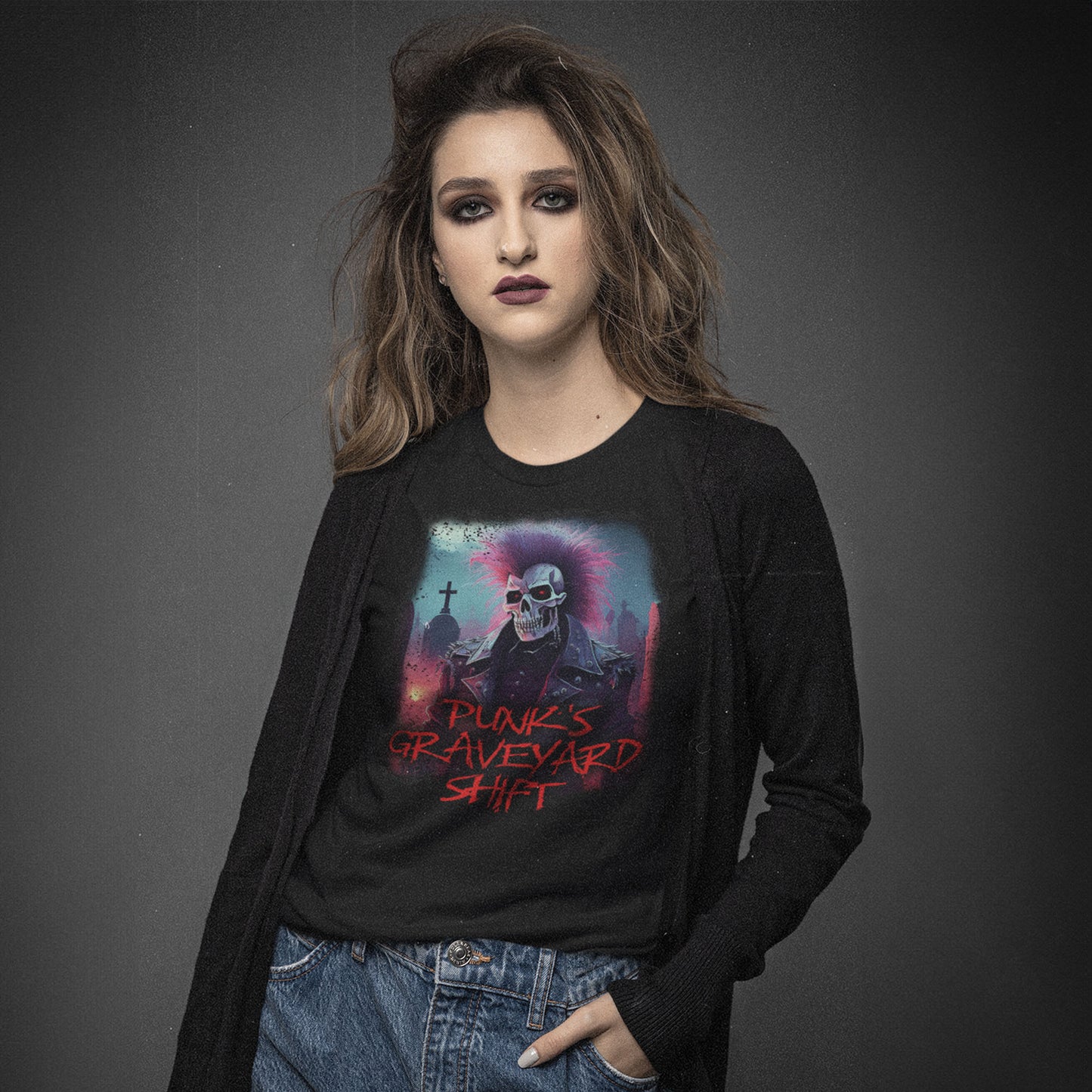 young-woman-wearing-a-black-t-shirt-with-goth-skeleton-shift-in-cementary-with-text-punks-graveyard-shift