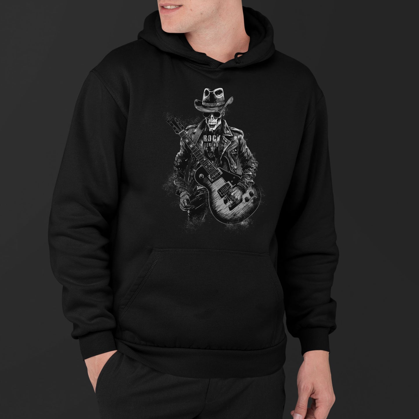 Man Wearing A Black Hoodie With A Rockstar Skeleton Print And Text Rock Leyend