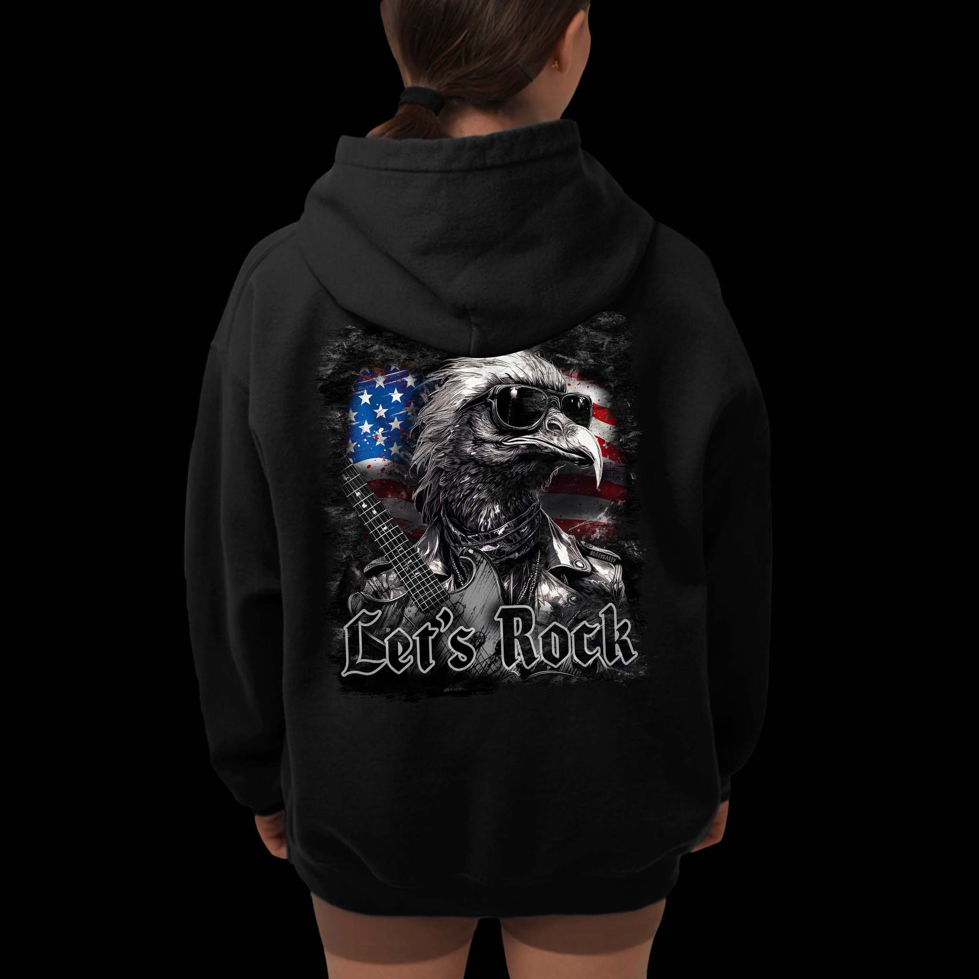 Woman Wearing A Black Hoodie With A Rocker Eagle With USA Flag Design And The Text Let's Rock