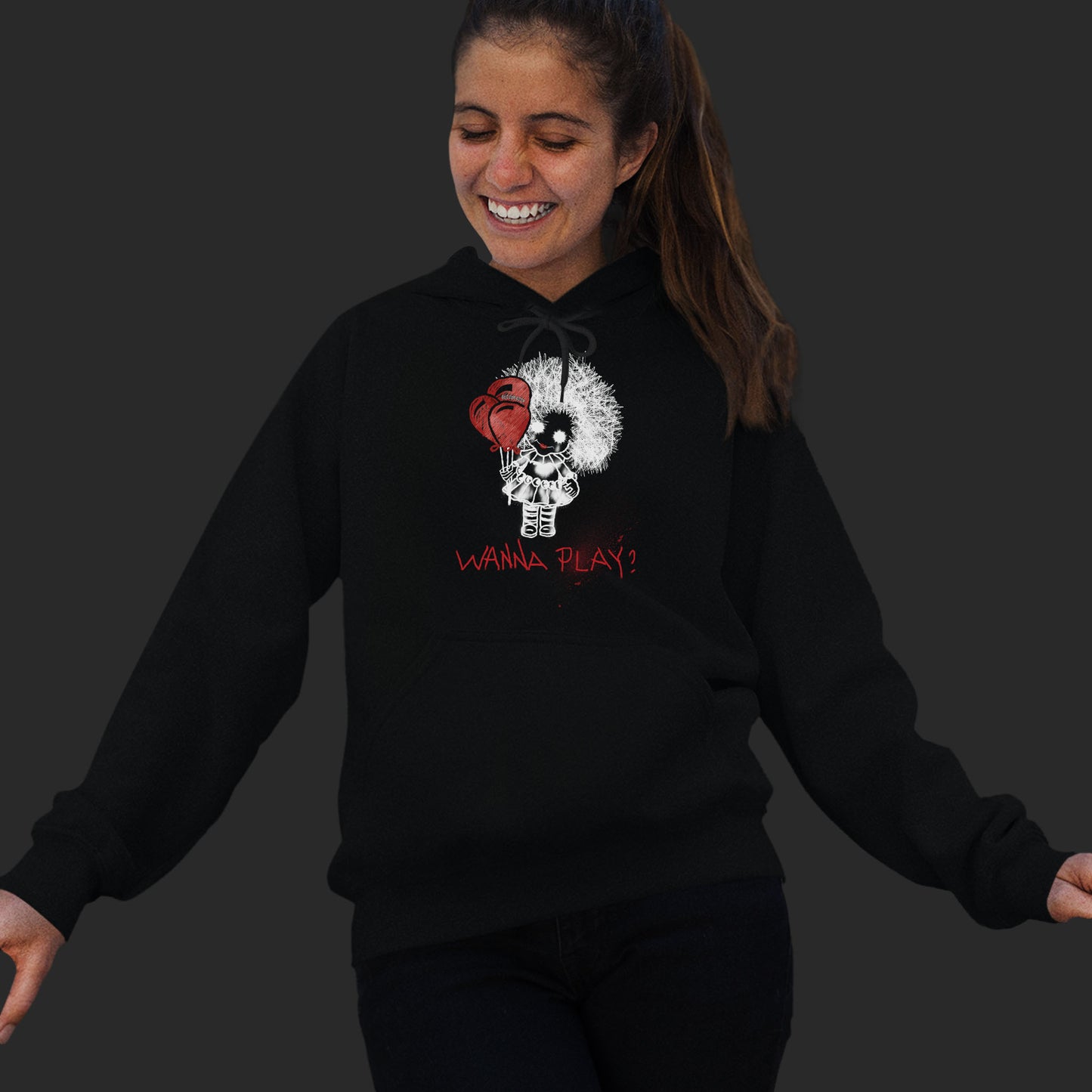 Woman Wearing A Black Hoodie With Spooky Girl Horror Design And Text Wanna Play