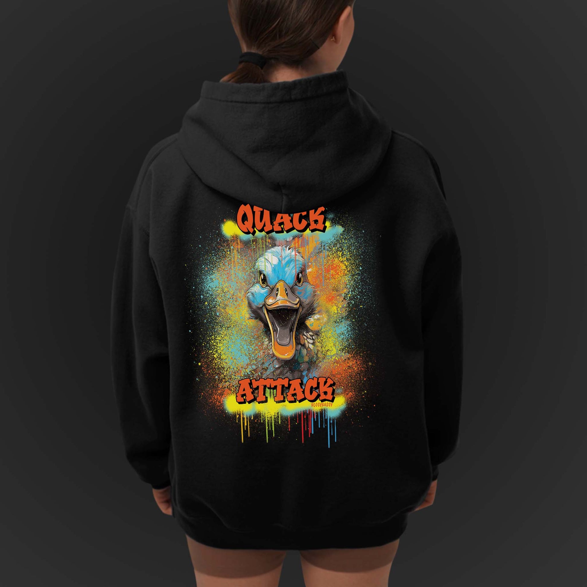 Young Woman Wearing A Black Hoodie With A Illustration Of A Colorfull Crazy Street Duck And Text Quack Attack-Graffiti Style Design