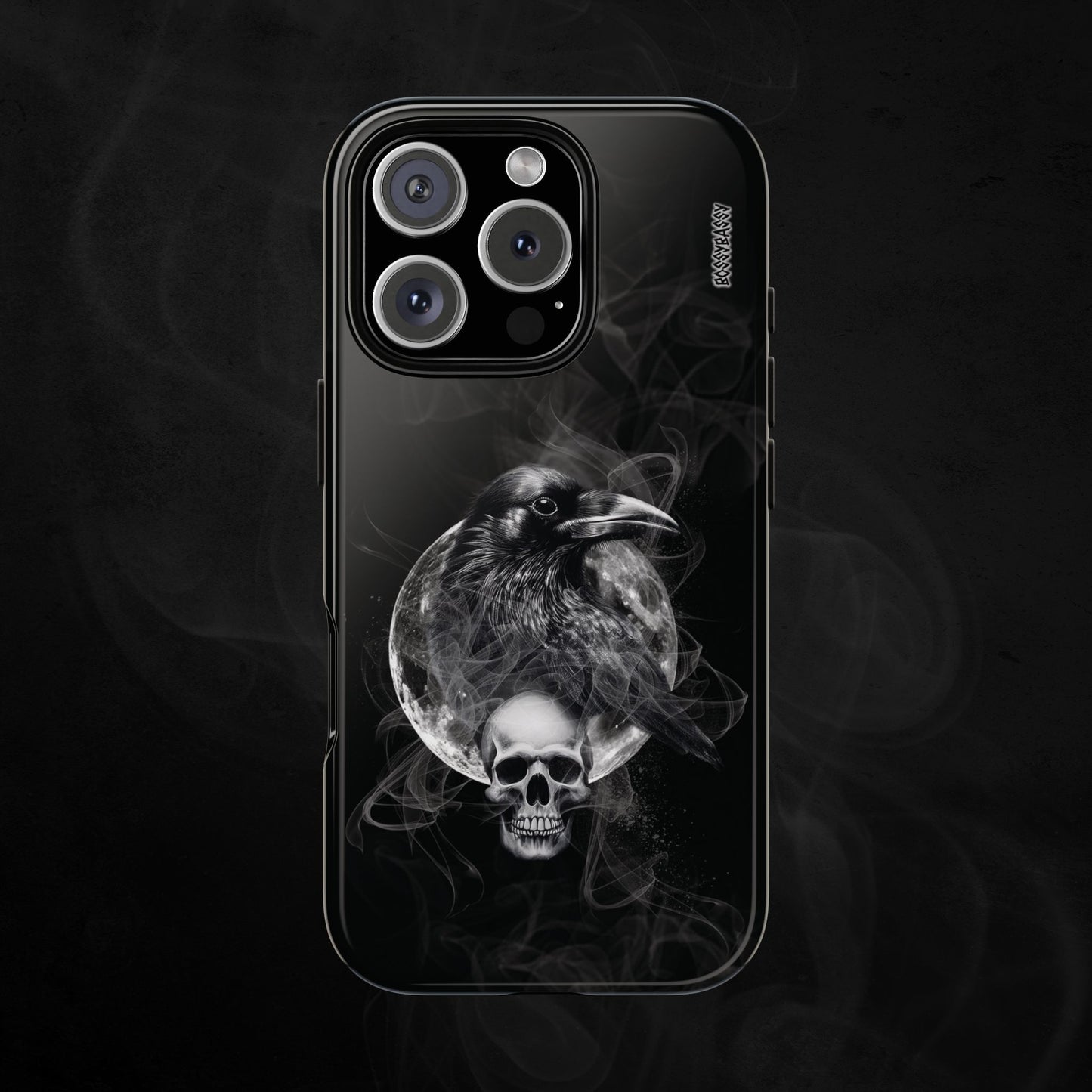 black glossy phone case features an illustration of a raven and skeleton at night time with a full moon