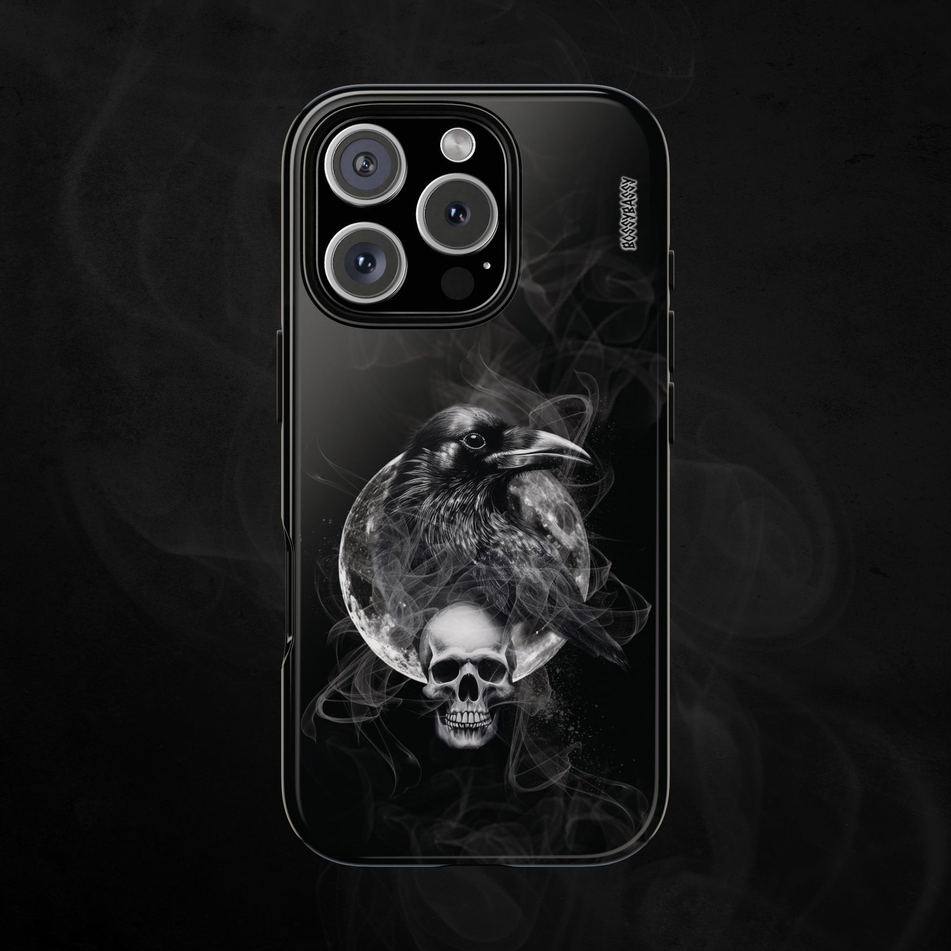 black glossy phone case features an illustration of a raven and skeleton at night time with a full moon