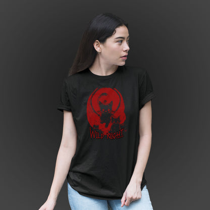 young woman wearing a black unisex tshirt features an illustration of black cats with a red background and the text wild night