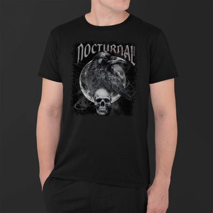 man-wearing-a-black-unisex-tshirt-with-raven-moon-and-skull-surrounded-by-smoke-with-text-nocturnal