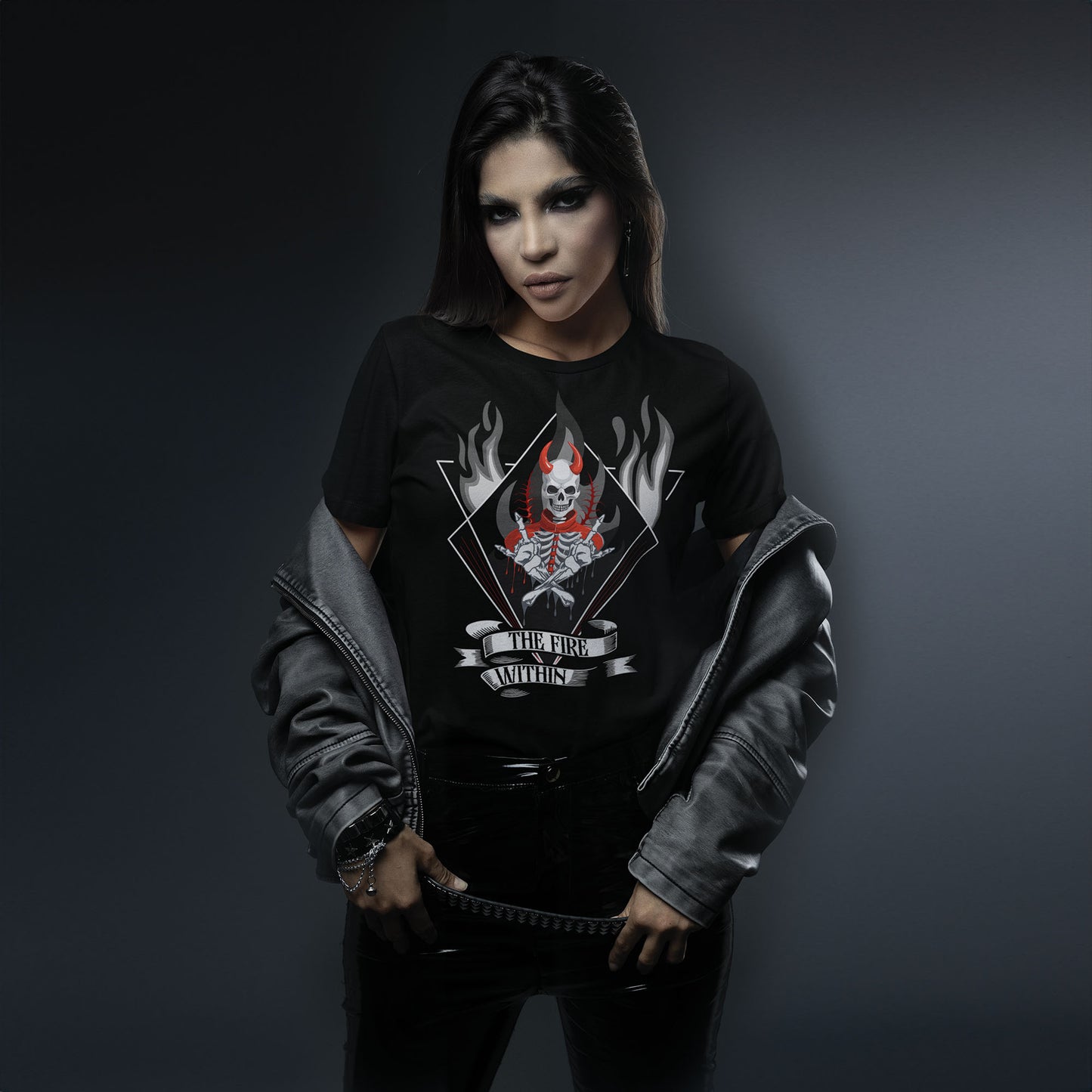 rocker-woman-wearing-a-black-t-shirt-with-evil-skeleton-print-with-text-the-fire-within