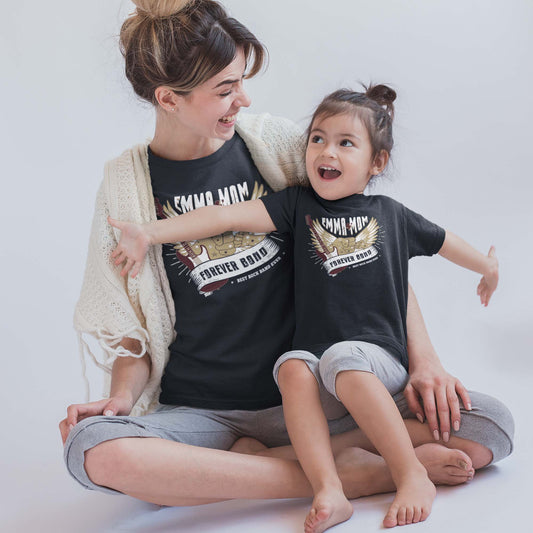 son-and-mom-wearing-a-black-t-shirts-with-a-guitar-and-rock-symbol-wings-and-personalized-text